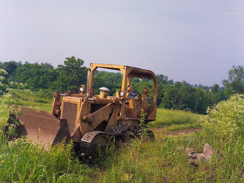 Bulldozer above the creek